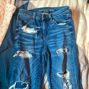 Dark blue distressed size 8 American eagle jeans